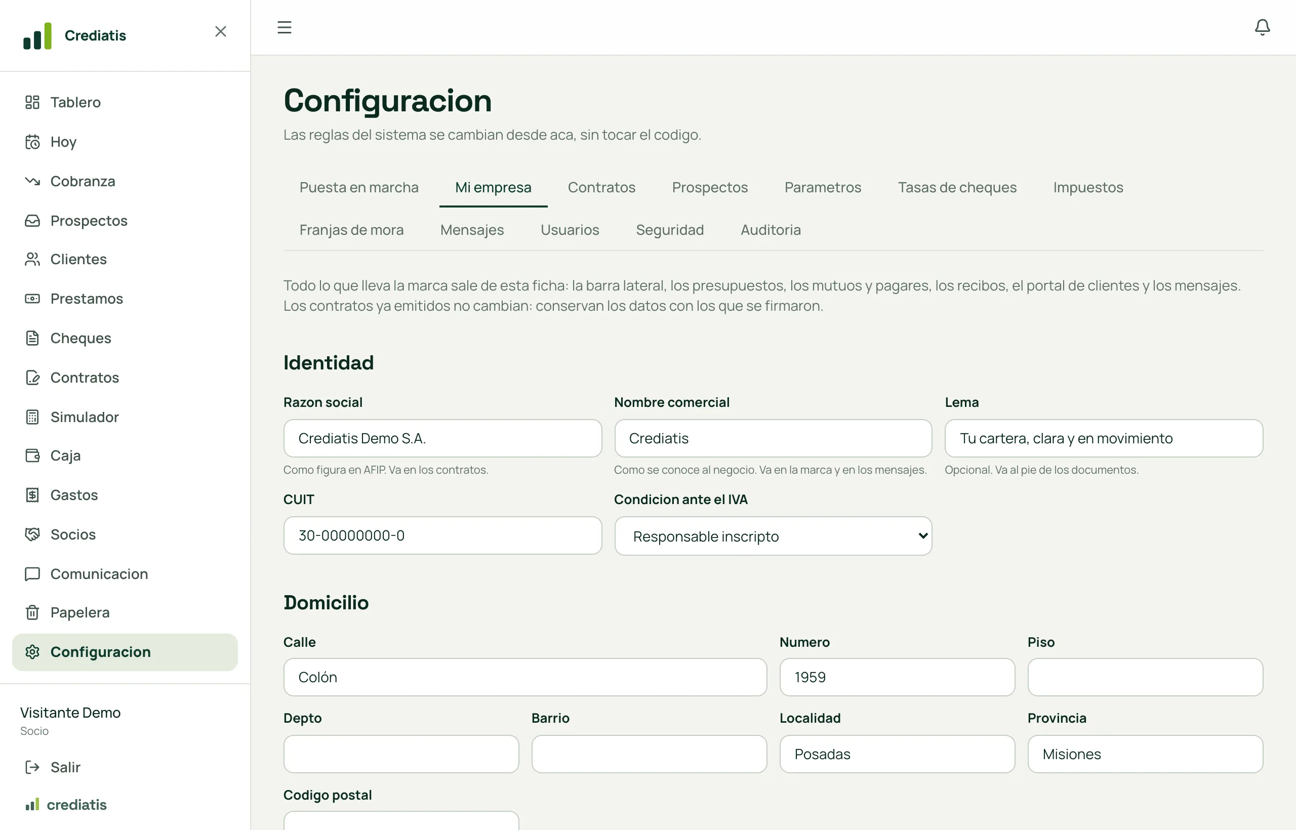 La pantalla de configuración con sus pestañas: puesta en marcha, mi empresa, contratos, prospectos, parámetros, tasas de cheques, impuestos, franjas de mora, mensajes, usuarios, seguridad y auditoría